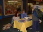 Cheryl Jebe and Sue McGregor, with Breezy, at the Capital Kennel Club of Juneau table. (39kb)